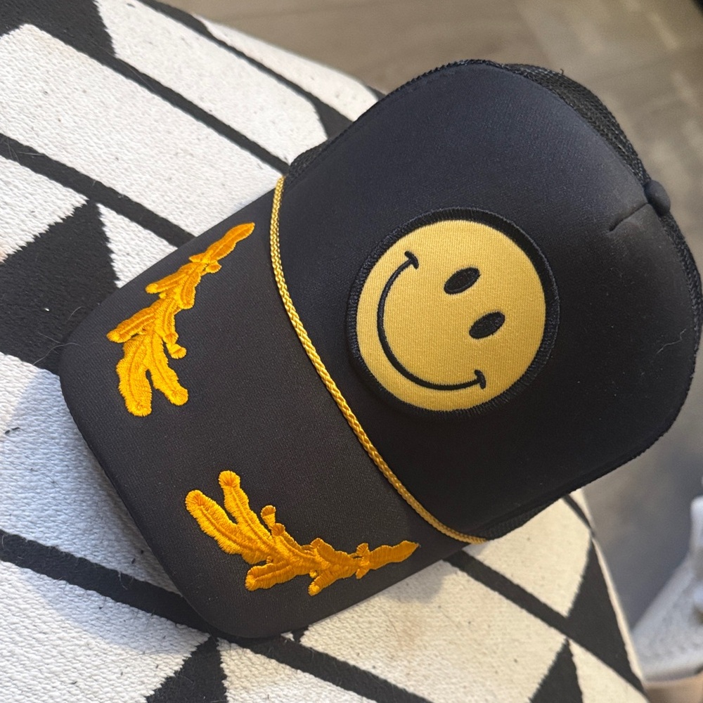 Black and Yellow Smiley Face trucker hat